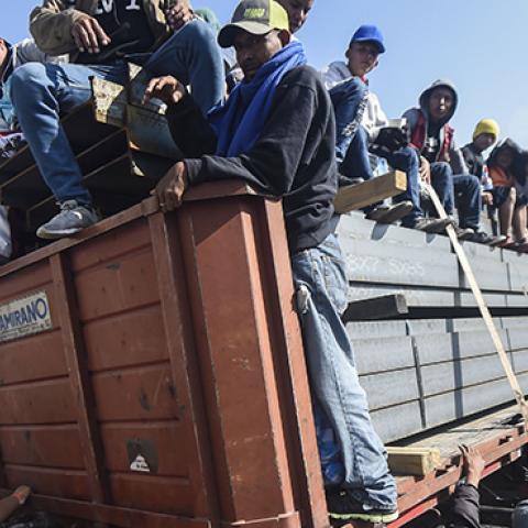Central American migrants taking part in a caravan to the U.S., are pictured on board a truck heading to Irapuato in the state of Guanajuato on November 11, 2018 after spending the night in Queretaro in central Mexico. (ALFREDO ESTRELLA/AFP/Getty Images)