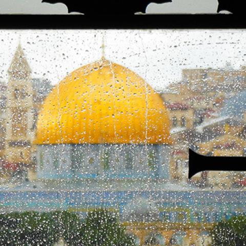 The "Dome of the Rock" is seen from the window of the Dominos Flevit Church on the Mount of Olives in Jerusalem. (GETTY IMAGES)