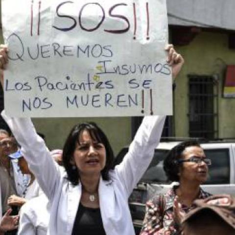 Healthcare professions protest outside a hospial in Caracas in April 2018 (Bloomberg)