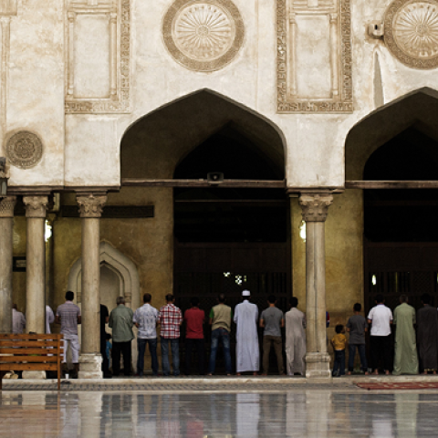 Egyptians perform the sunset prayer after the first fasting day of the Muslim holy month of Ramadan at the Al-Ahzar mosque in Cairo on July 10, 2013. (GIANLUIGI GUERCIA/AFP/Getty Images)