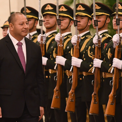 Tonga's King Tupou VI (C) reviews a military honour guard with Chinese President Xi Jinping during a welcome ceremony in the Great Hall of the People in Beijing on March 1, 2018. (GREG BAKER/AFP/Getty Images)