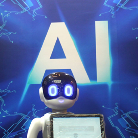 Visitors look at an Artificial Intelligence (AI) robot during the 5th Popular Science Products Expo at Shanghai Exhibition Center on August 27, 2018 in Shanghai, China. (VCG via Getty Images)