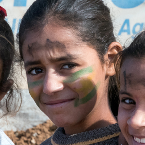 Girls in front of a UNHCR refugee tent in the Hasan Sham refugee camp. The tent camp near the largely destroyed former IS stronghold of Mossul accommodates 3,300 of the 1.8 million internally displaced persons in Iraq. (picture alliance via Getty Images)