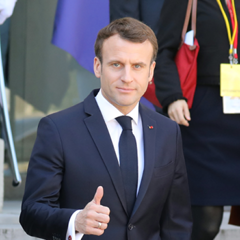 French President Emmanuel Macron (C) gestures next to German Chancellor Angela Merkel (R) and Chinese President Xi Jinping (L) following their meeting at the Elysee Palace in Paris on March 26, 2019. (LUDOVIC MARIN/Getty Images)