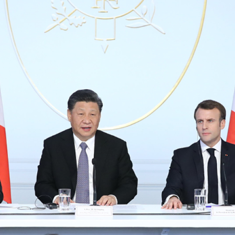 Chinese President Xi Jinping, French President Macron, and German Chancellor Merkel attend the closing ceremony of a global governance forum in Paris, France, March 26, 2019. (Getty Images)