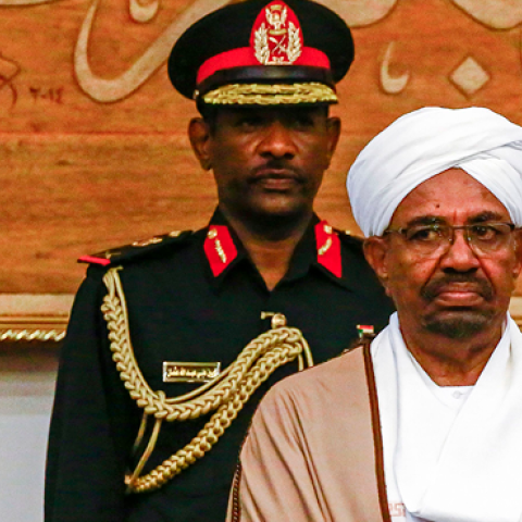 Sudan's President Omar al-Bashir attends a meeting with his new 20-member cabinet as they take oath at the presidential palace in the capital on March 14, 2019. (ASHRAF SHAZLY/AFP/Getty Images)