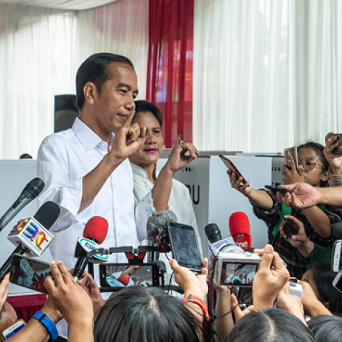 Indonesian President Joko Widodo and his wife Iriana speak to journalist after the election at a polling station in Jakarta, Indonesia, on April 17, 2019. (Barcroft Media/Getty Images)