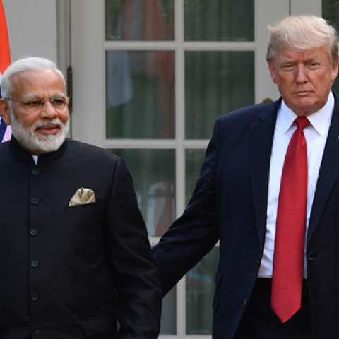 US President Donald Trump guides Indian Prime Minister Narendra Modi towards a joint press conference at The White House on June 26, 2017. (NICHOLAS KAMM/Getty Images)