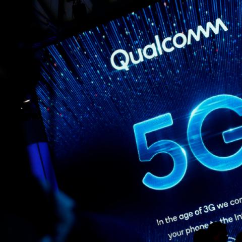 People visit the Qualcomm stand at the Mobile World Congress (MWC) in Barcelona on February 27, 2019. (PAU BARRENA/AFP/Getty Images)
