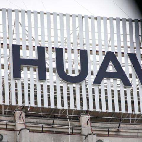 A Huawei logo is seen on top of an office building in Bucharest, Romania on May 1, 2019. (NurPhoto/Getty Images)