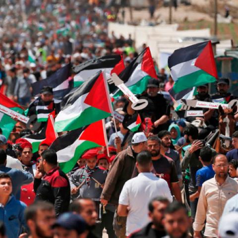Palestinian demonstrators gather east of Gaza City in the Gaza Strip on May 15, 2019, during a protest marking the 71st anniversary of Nakba. (MAHMUD HAMS/Getty Images)