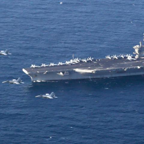 The Abraham Lincoln Carrier Strike Group and a U.S. Air Force B-52H Stratofortress, conduct joint exercises. (U.S. Navy photo/Flikr)