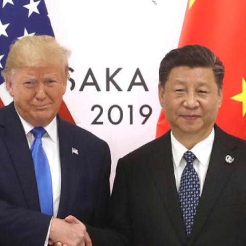 Chinese President Xi Jinping (R) shakes hands with US President Donald Trump before a bilateral meeting during the G20 Summit on June 29, 2019 in Osaka, Japan. (VCG/Getty Images)