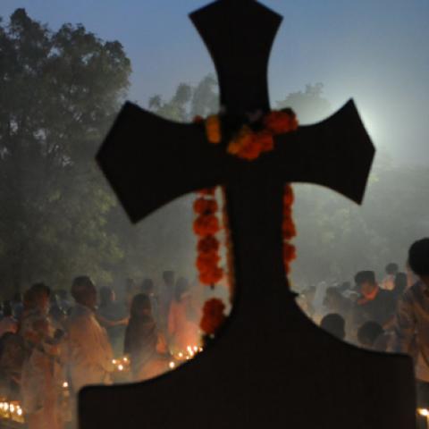Christians offering prayers for the departed souls of their loved ones on the occasion of All Souls Day, at a cemetery on November 2, 2016 in Bhopal, India. (Hindustan Times/Getty Images)