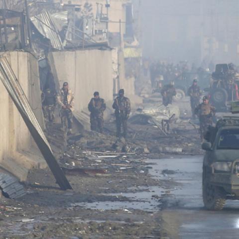 Afghan security forces gather at the site of a powerful truck bomb attack (claimed by the Taliban) a day after it detonated near a foreign compound in Kabul on January 15, 2019. (WAKIL KOHSAR/AGetty Images)