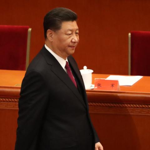Chinese President Xi Jinping enters the Great Hall of the People to deliver a speech. (Andrea Verdelli/Getty Images)