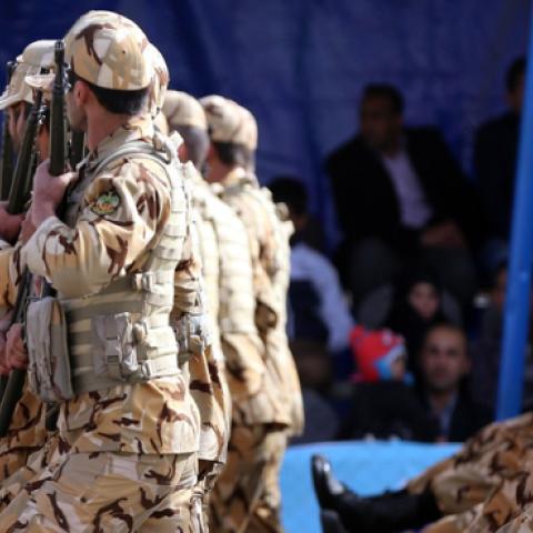 Iranian Army soldiers march past President Hassan Rouhani during the Army Day parade in Tehran on April 18, 2015. (Getty Images)