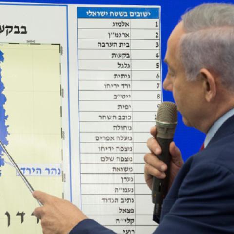 Israeli Prime Minster Benjamin Netanyahu points to a Jordan Valley map during his announcement on September 10, 2019 in Ramat Gan, Israel. (Amir Levy/Getty Images)