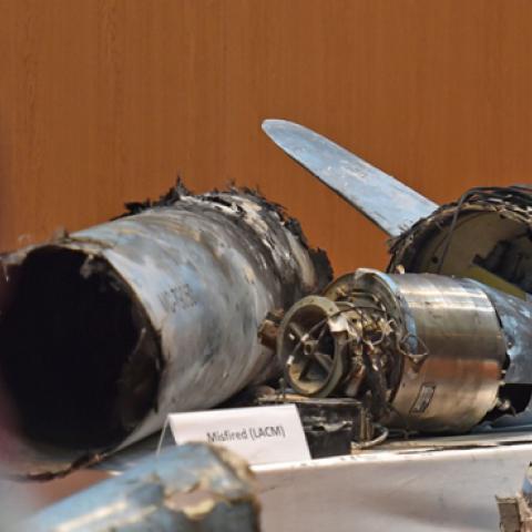 Displayed fragments of what the Saudi defence ministry spokesman said were Iranian cruise missiles and drones recovered from the attack site that targeted Saudi Aramco's facilities. (FAYEZ NURELDINE/Getty Images) 