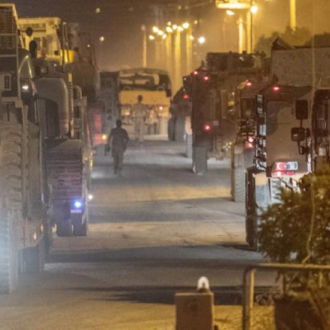 Turkish army soldiers drive towards the border with Syria near Akcakale in Sanliurfa province on October 8, 2019. (AFP/Getty Images)
