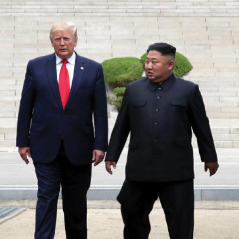A handout photo provided by Dong-A Ilbo of North Korean leader Kim Jong Un and U.S. President Donald Trump inside the demilitarized zone (DMZ) separating the South and North Korea on June 30, 2019. (Dong-A Ilbo/Getty Images)