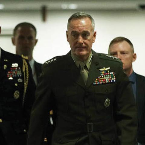  Chairman of Joint Chiefs of Staff General Joseph Dunford (C) arrives at a closed briefing for Senate members May 21, 2019 on Capitol Hill in Washington, DC.