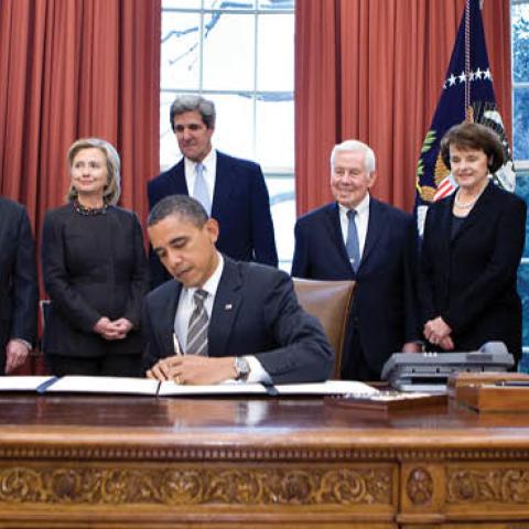 President Barack Obama signs the instrument of ratification of the New START Treaty in the Oval Office, Feb. 2, 2011. 