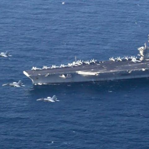 The Abraham Lincoln Carrier Strike Group and a U.S. Air Force B-52H Stratofortress, conduct joint exercises.