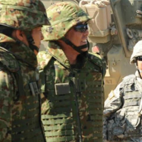 U.S. Army Maj. Gen. Stephen R. Lanza, right, commander of the 7th Infantry Division, meets Japanese Maj. Gen. Takeyoshi Omari, deputy commander of 4th Division, Japan Ground Self-Defense Force, during Rising Thunder at the Yakima Training Center
