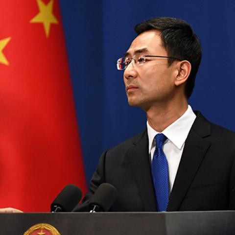 Chinese Foreign Ministry spokesman Geng Shuang speaks during the daily press briefing in Beijing on March 18, 2020. (GREG BAKER/AFP via Getty Images)