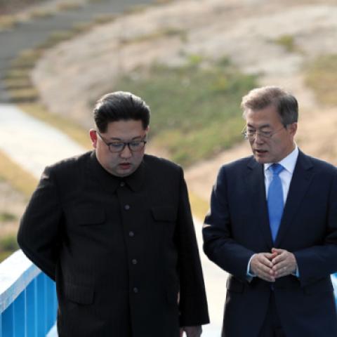 North Korean leader Kim Jong-un and South Korean President Moon Jae-in talk in private during the Inter-Korean Summit on April 27, 2018 in Panmunjom, South Korea. (Inter-Korean Press Corp/NurPhoto via Getty Images)
