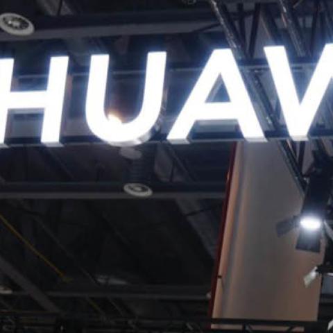 Workers set up the Huawei booth before the 2nd Zhejiang International Intelligent Transportation Industry Expo on December 5, 2019 in Hangzhou, Zhejiang Province of China. The expo will be held in Hangzhou from December 6 to 8.