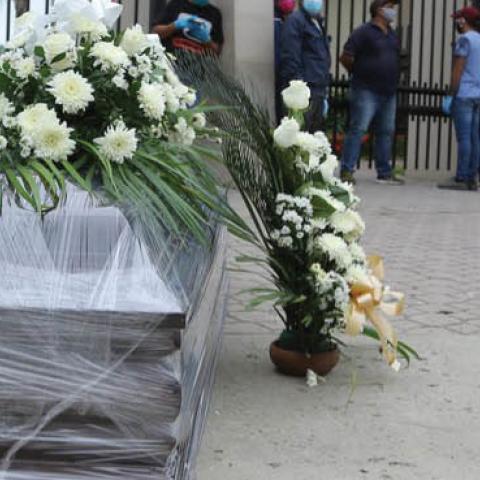 Relatives of the deceased line up for a funeral in Guayaquil, Ecuador, a city hit hard by the coronavirus, April 5.