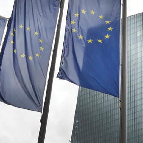 Flags of Europe flutter in front of the headquarters of the European Central Bank (ECB) in Frankfurt am Main, western Germany, on June 1, 2018.
