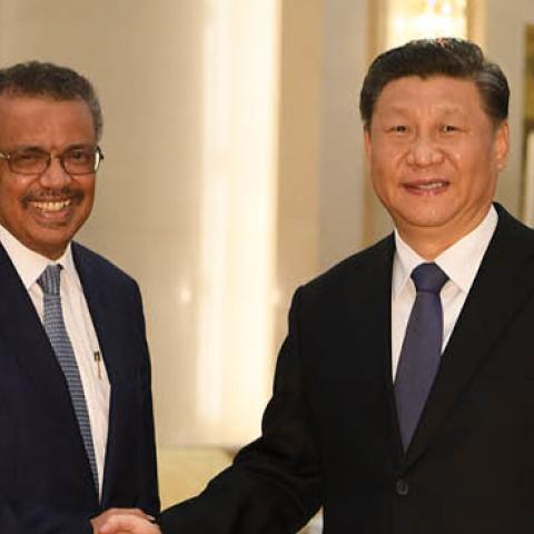 Tedros Adhanom, Director General of the World Health Organization, (L) shakes hands with Chinese President Xi Jinping before a meeting at the Great Hall of the People, on January 28, 2020 in Beijing, China. 