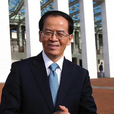 Chinese Ambassador to Australia Cheng Jingye poses during a photo shoot outside Parliament House in Canberra, Australian Capital Territory