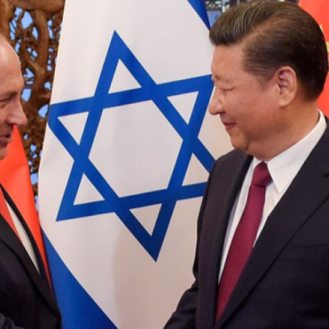 China's President Xi Jinping and Israel's Prime Minister Benjamin Netanyahu shake hands ahead of their talks at Diaoyutai State Guesthouse in Beijing on March 21, 2017. (ETIENNE OLIVEAU/AFP via Getty Images)