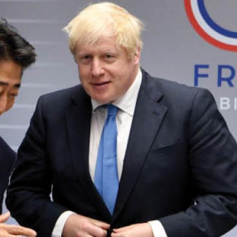U.K. Prime Minister Boris Johnson meets with Japanese Prime Minister Shinzo Abe on day three of the G-7 Summit in Biarritz, France, on Aug. 26, 2019.