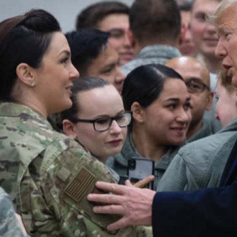 US President Donald Trump greets members of the US military during a stop at Ramstein Air Base in Germany, on December 27, 2018.