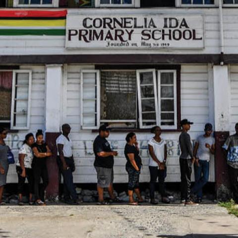 Guyanese citizens line up to vote, in Leonora, Guyana on March 2, 2020. 