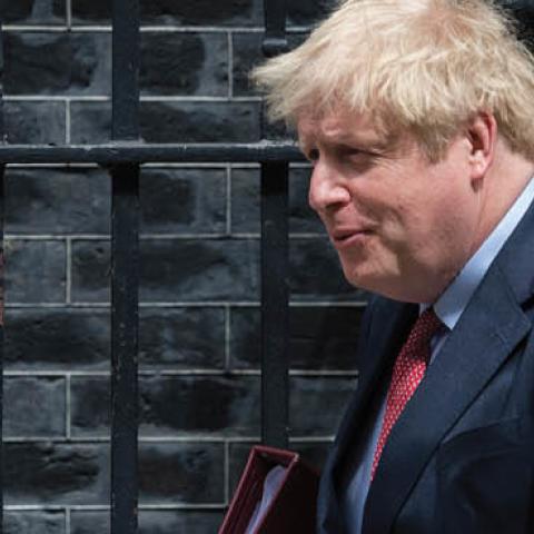 British Prime Minister Boris Johnson leaves 10 Downing Street for PMQs at the House of Commons on 15 July, 2020 in London, England.