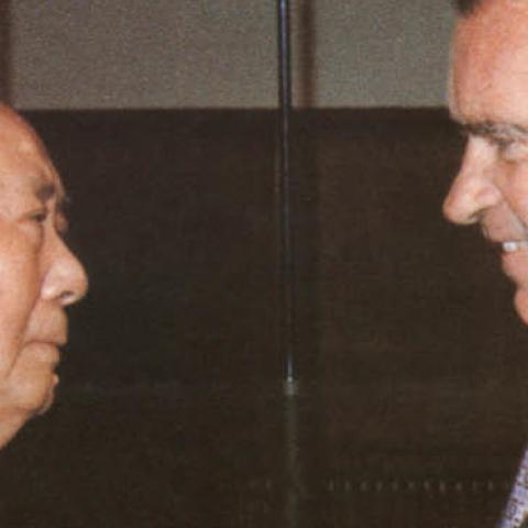 Chinese communist leader Chairman Mao Zedong (L) welcomes US President Richard Nixon, at his house in Beijing