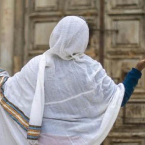 An Ethiopian Christian prays outside the Church of the Holy Sepulchre in Jerusalem, April 19, 2020. 