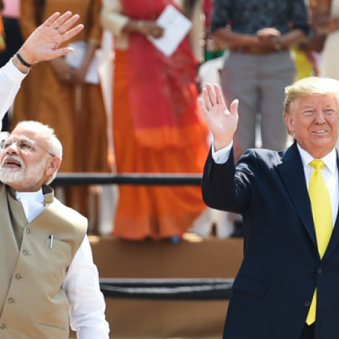 Donald Trump and Narendra Modi wave at the crowd during 'Namaste Trump' rally at Sardar Patel Stadium in Motera, on the outskirts of Ahmedabad, on February 24, 2020. (MONEY SHARMA/AFP via Getty Images)