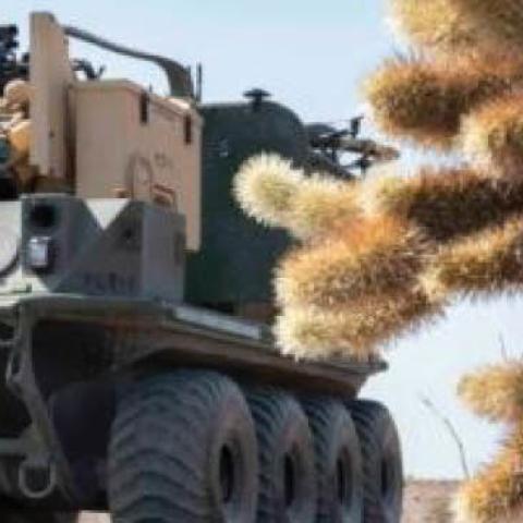 An experimental Army robot, nicknamed Origin, at the Project Convergence exercise at Yuma Proving Ground, Ariz.