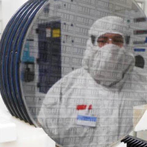 A worker at a semiconductor fabrication facility owned by Dutch chipmaker NXP Semiconductors N.V. in Chandler, Ariz., in an undated photo provided on September 29, 2020.
