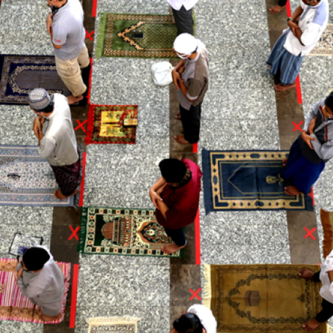 Indonesian Muslims wearing masks and maintaining social distance perform Friday prayer at the At-Tin Grand Mosque in Jakarta, Indonesia on June 5, 2020. (Eko Siswono Toyudho/Anadolu Agency via Getty Images)