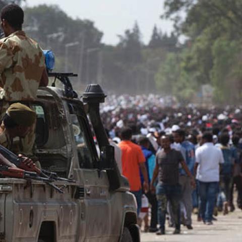 Oromo regional police officers wait in a pick up car during the Oromo new year holiday Irreechaa in Bishoftu on October 2, 2016 (ZACHARIAS ABUBEKER/AFP via Getty Images)