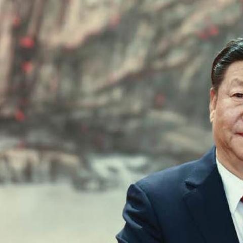 Chinese President speaks at the podium during the unveiling of the Communist Party's new Politburo Standing Committee at the Great Hall of the People on October 25, 2017 in Beijing, China.