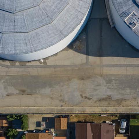 An aerial view shows homes near the Dominguez Hill Tank Farm Oil Storage Terminal.